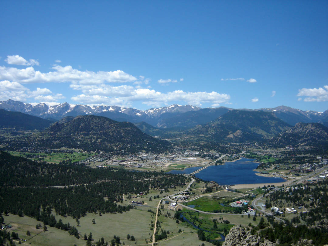 This is an image of the Estes Valley, Estes Park and Estes Lake, all home for This Mountain Life Estes Park Basecamp and Vacation Rental Cabins. 