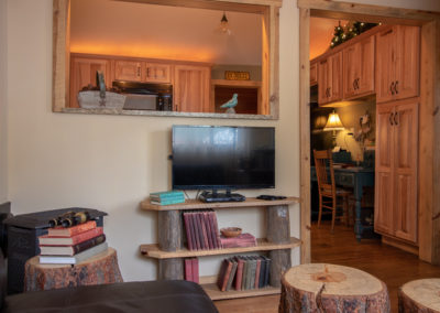 This is an image of Redemption Cabin's Living Room with flatscreen tv and fire stick