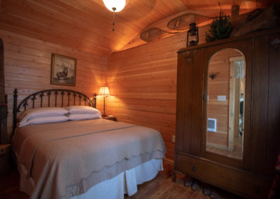 Redemption Cabin is an extraordinary vacation rental cabin near RMNP in Estes Park CO USA. This is an image of its front bedroom.
