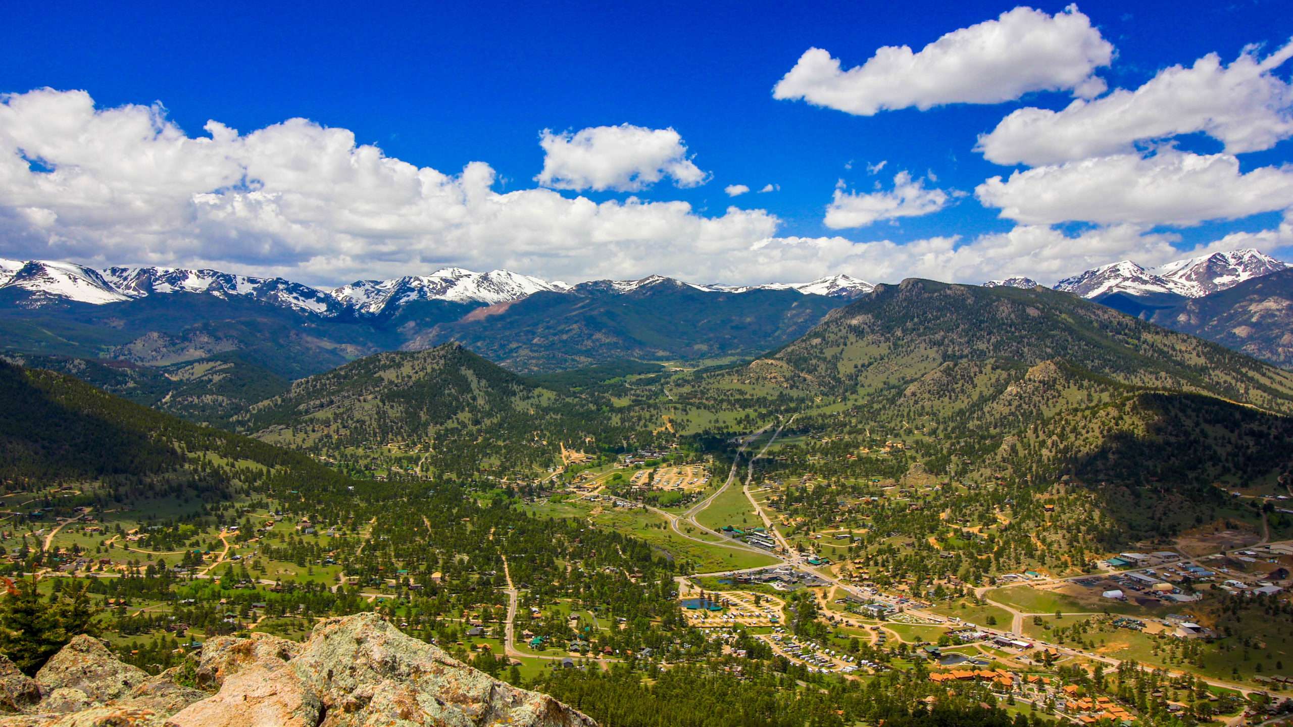 This is an aerial image looking west up to Beaver Meadows Entrance into Rocky Mountain National Park. This main entrance into the park is less than 3 miles away from This Mountain Life Basecamp.