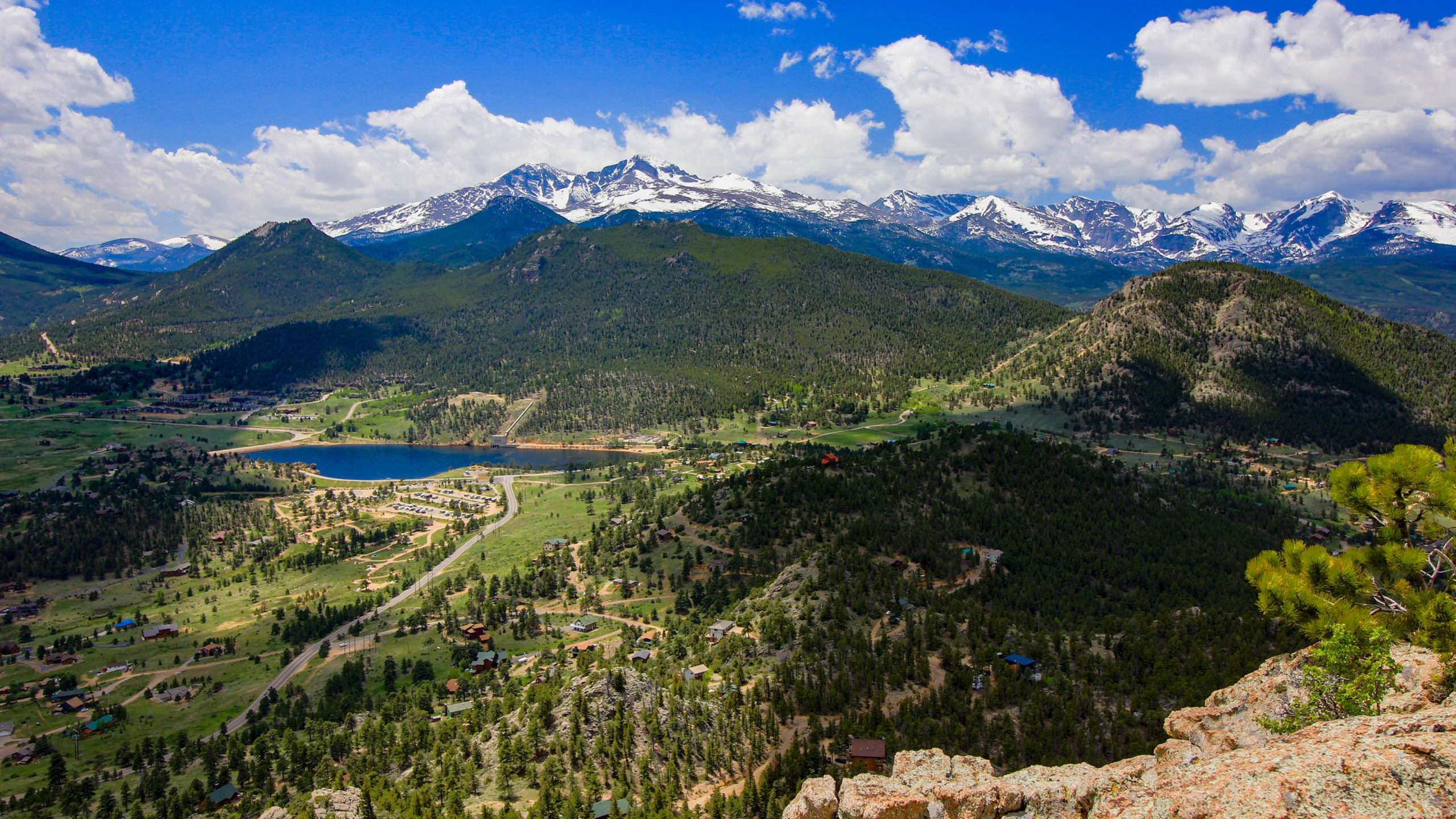 This is an image from higher up over Prospect Mountain looking south to southwest showing Marys Lake, Lilly Mountain, the Indian Peaks, Estes Cone, Mount Meeker, Longs Peak, Pagoda Mountain, Chiefs Head, Powell Mountain, Taylor Peak, Otis Peak, Hallet Peak and Flattop Mountain at the extreme right with Giant Track in its foreground.